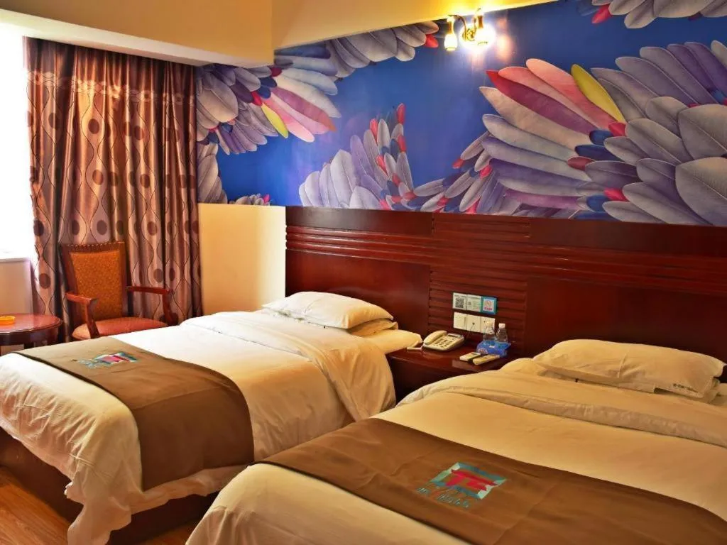 Bed in Hotel Pai Hezhou Lingfeng Plaza