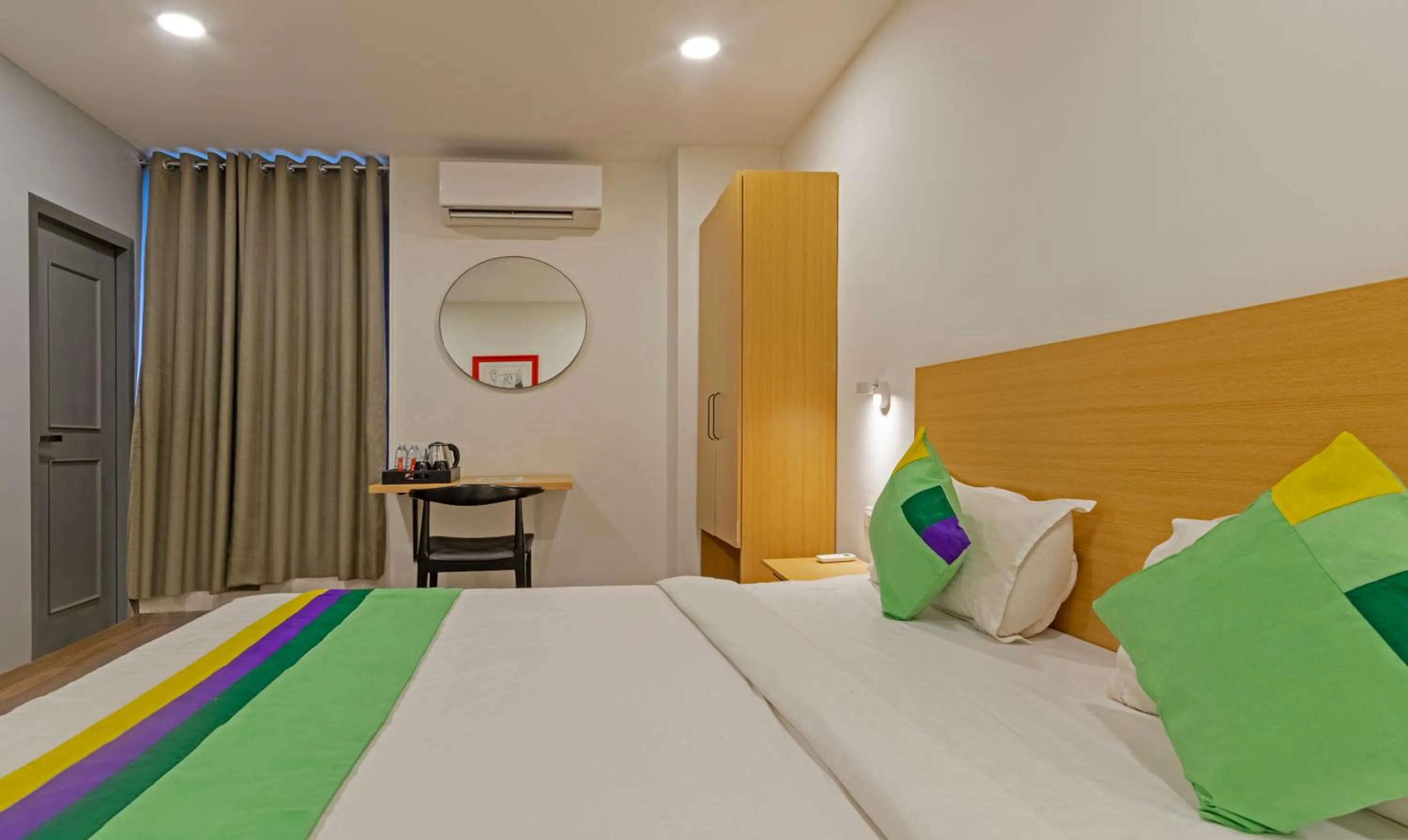 Bedroom, Bed in Treebo The Square