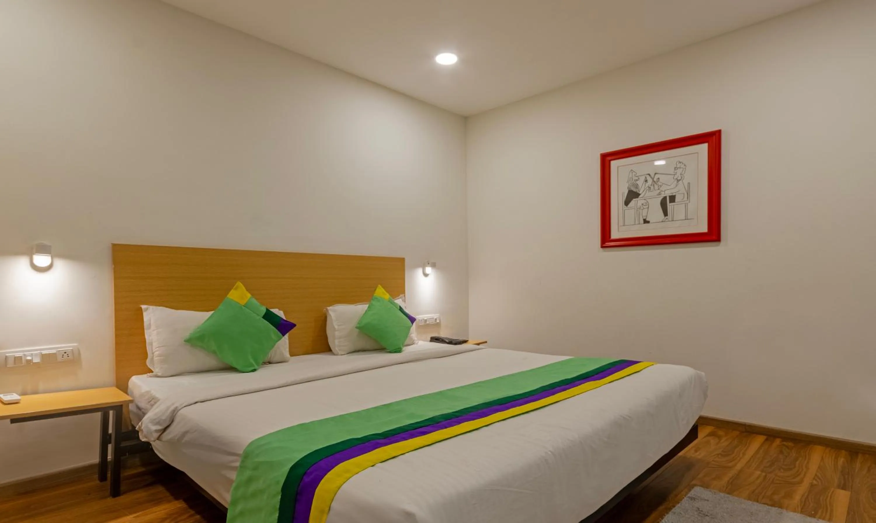 Bedroom, Bed in Treebo The Square