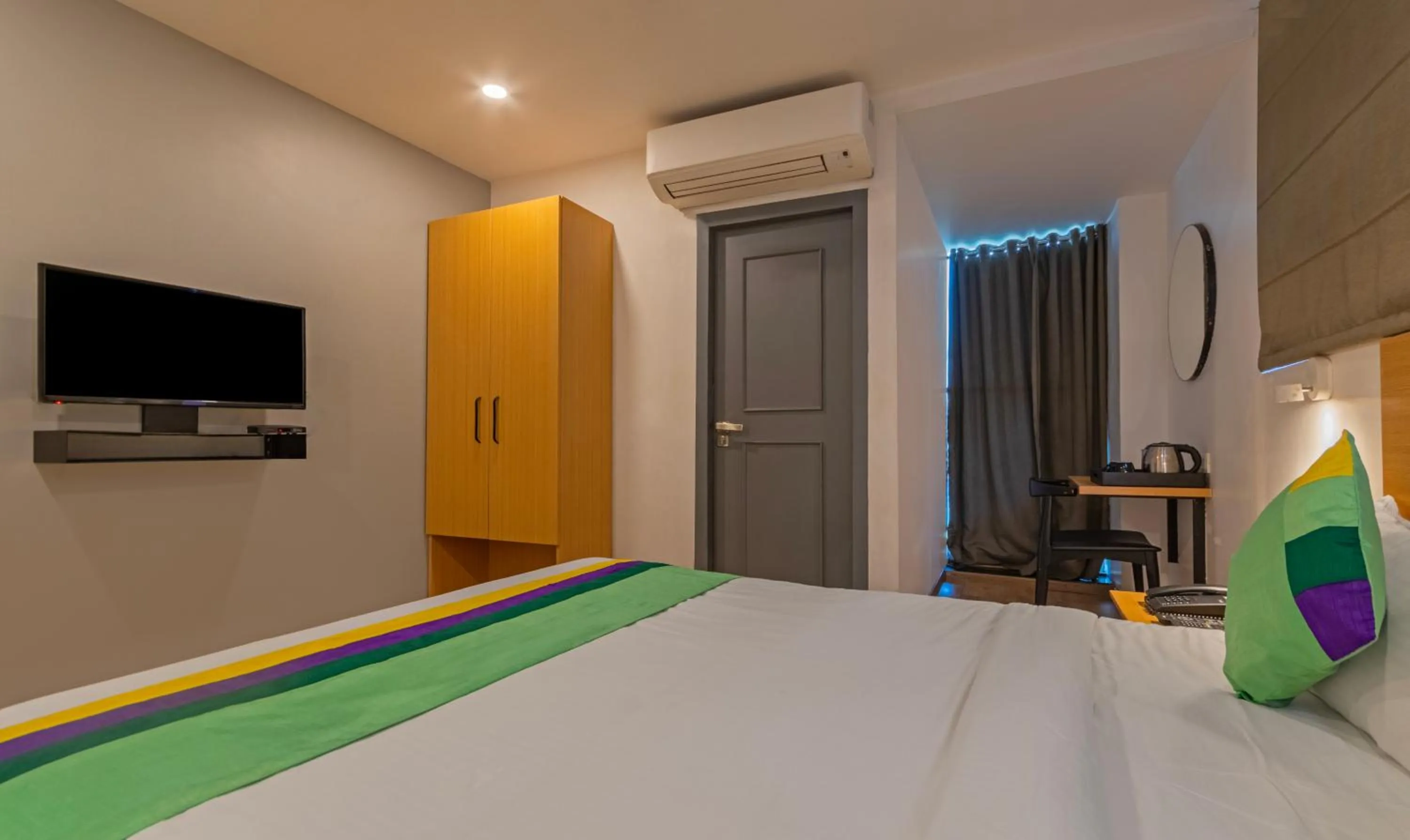 Bedroom, Bed in Treebo The Square