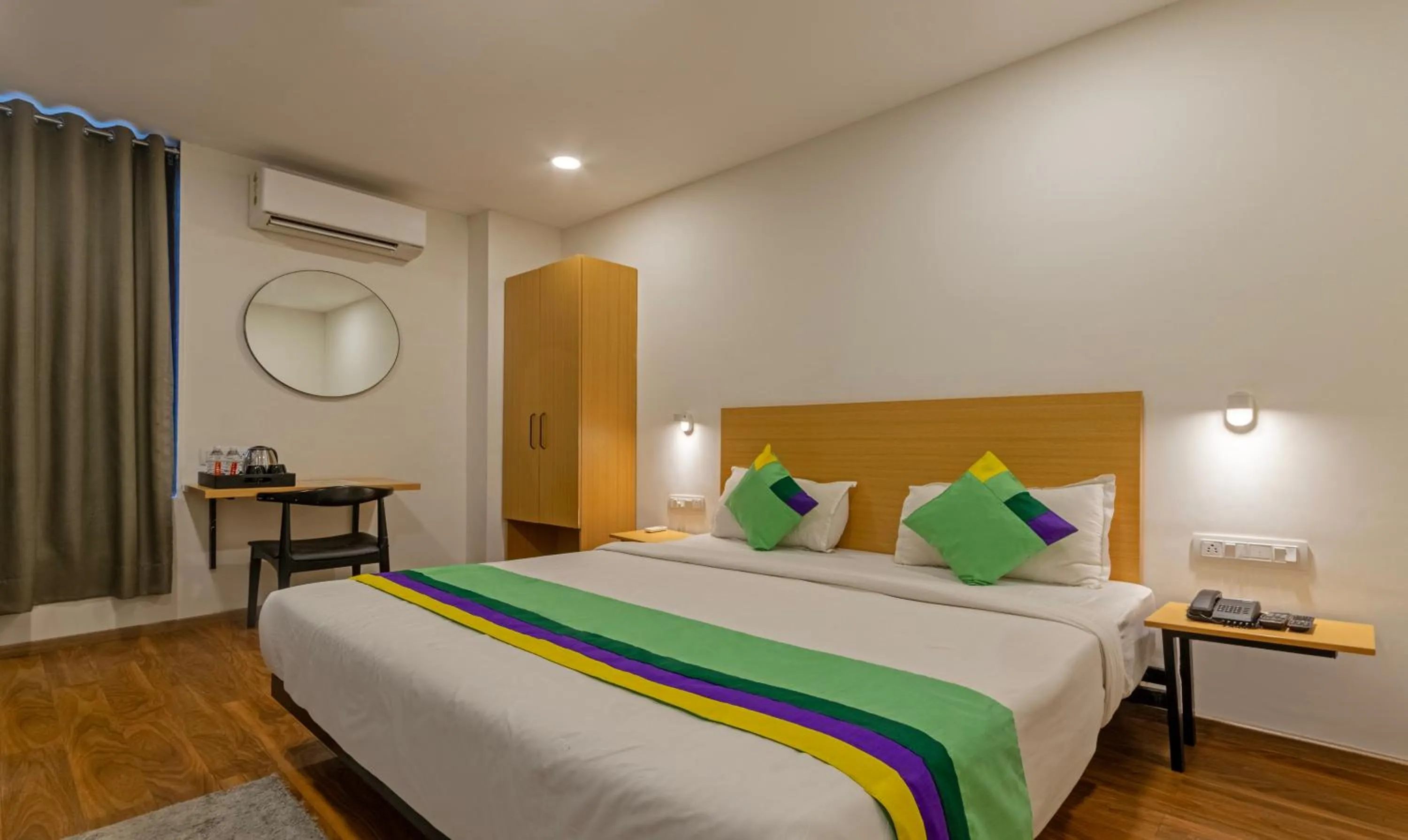 Bedroom, Bed in Treebo The Square