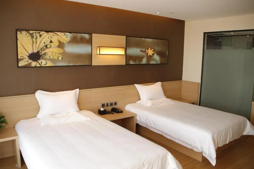 Bed in IU Hotel Zhangye High-Speed Railway Station