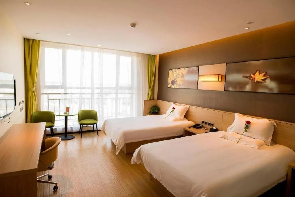 Bed in IU Hotel Zhangye High-Speed Railway Station