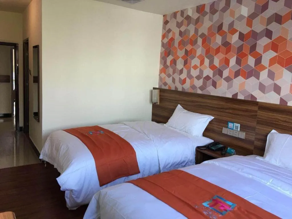 Bed in PAI Hotel Guangzhou Baiyun International Airport Zhongluotan Zhuliao Metro Station