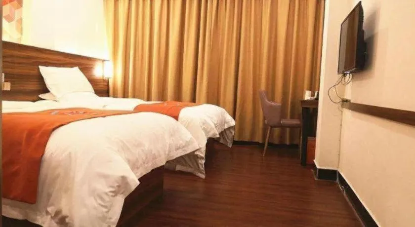 Bed in PAI Hotel Guangzhou Baiyun International Airport Zhongluotan Zhuliao Metro Station