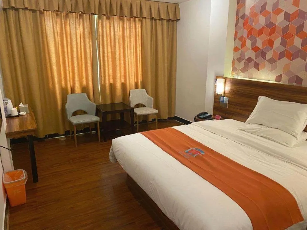 Bed in PAI Hotel Guangzhou Baiyun International Airport Zhongluotan Zhuliao Metro Station