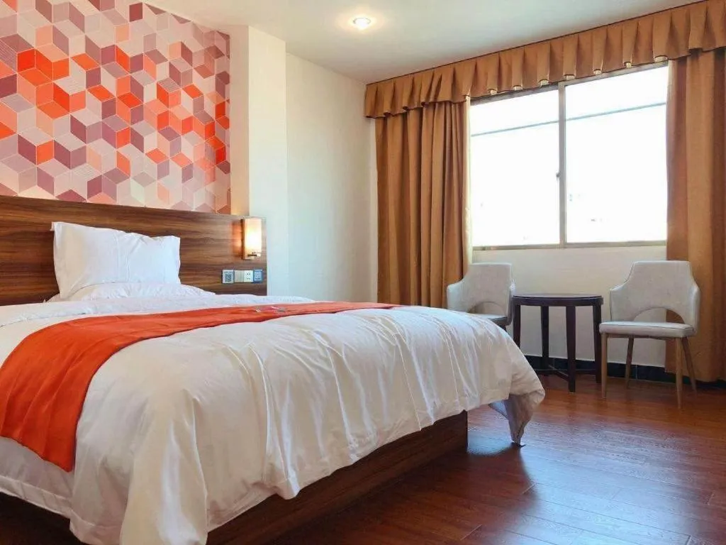 Bed in PAI Hotel Guangzhou Baiyun International Airport Zhongluotan Zhuliao Metro Station