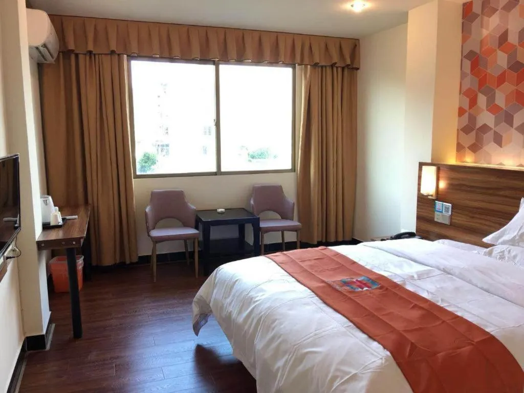 Bed in PAI Hotel Guangzhou Baiyun International Airport Zhongluotan Zhuliao Metro Station
