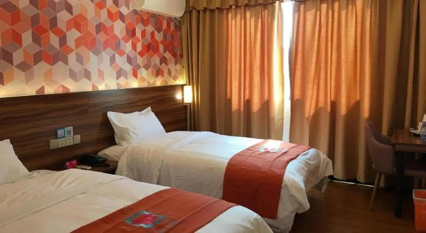 Bed in PAI Hotel Guangzhou Baiyun International Airport Zhongluotan Zhuliao Metro Station