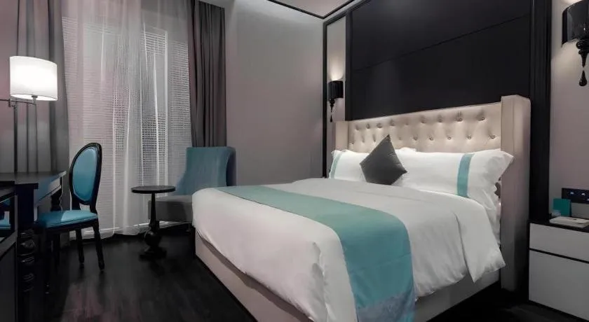 Bed in Xana Hotelle·Yutian