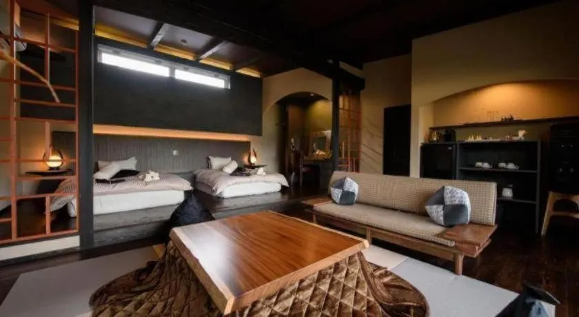 Bed in Yufuin Luxury Villa -zakuro-