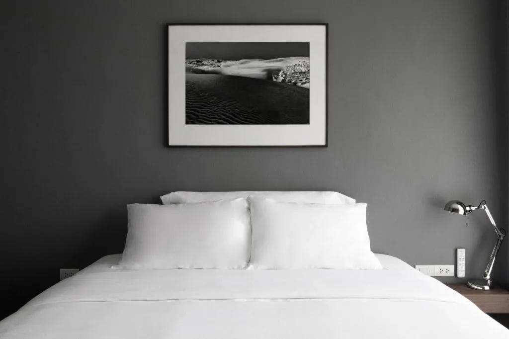 Bed in Rangsiya Boutique Hotel