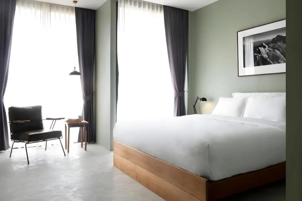 Bed in Rangsiya Boutique Hotel