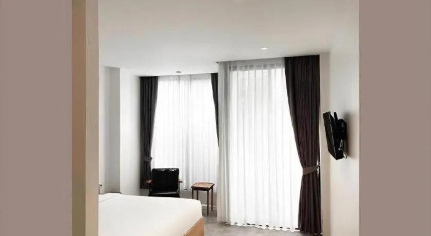 Bed in Rangsiya Boutique Hotel