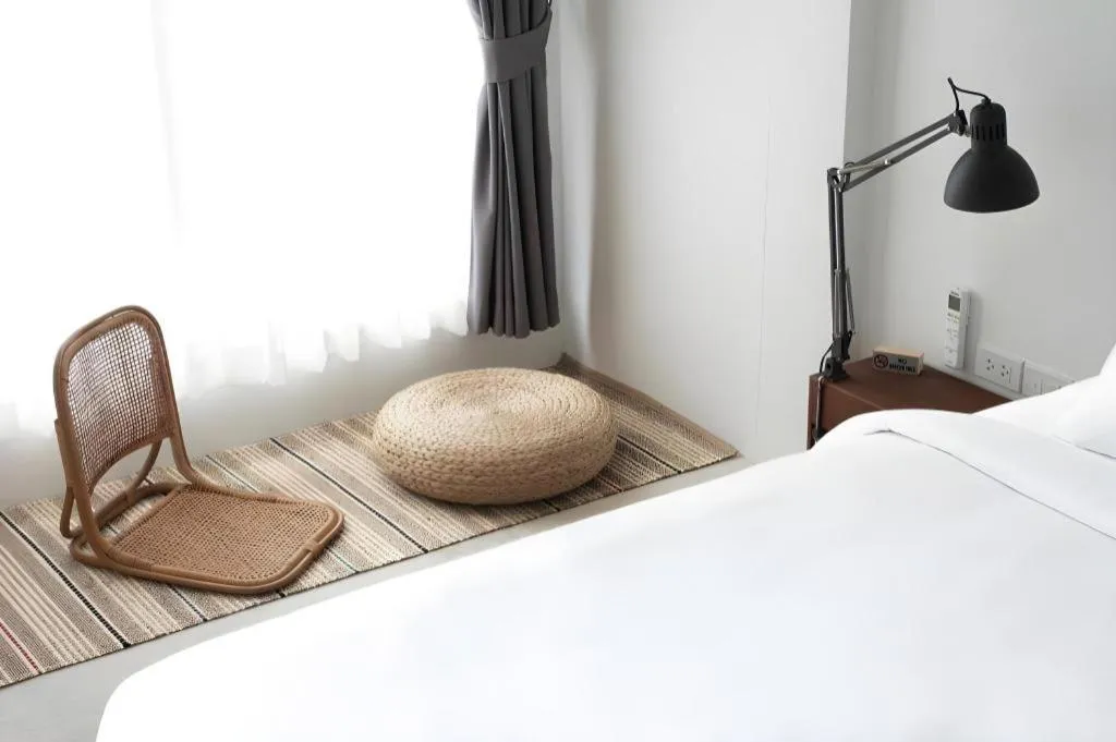 Bed in Rangsiya Boutique Hotel