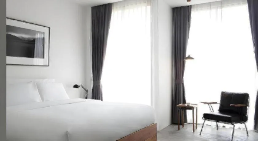 Bed in Rangsiya Boutique Hotel