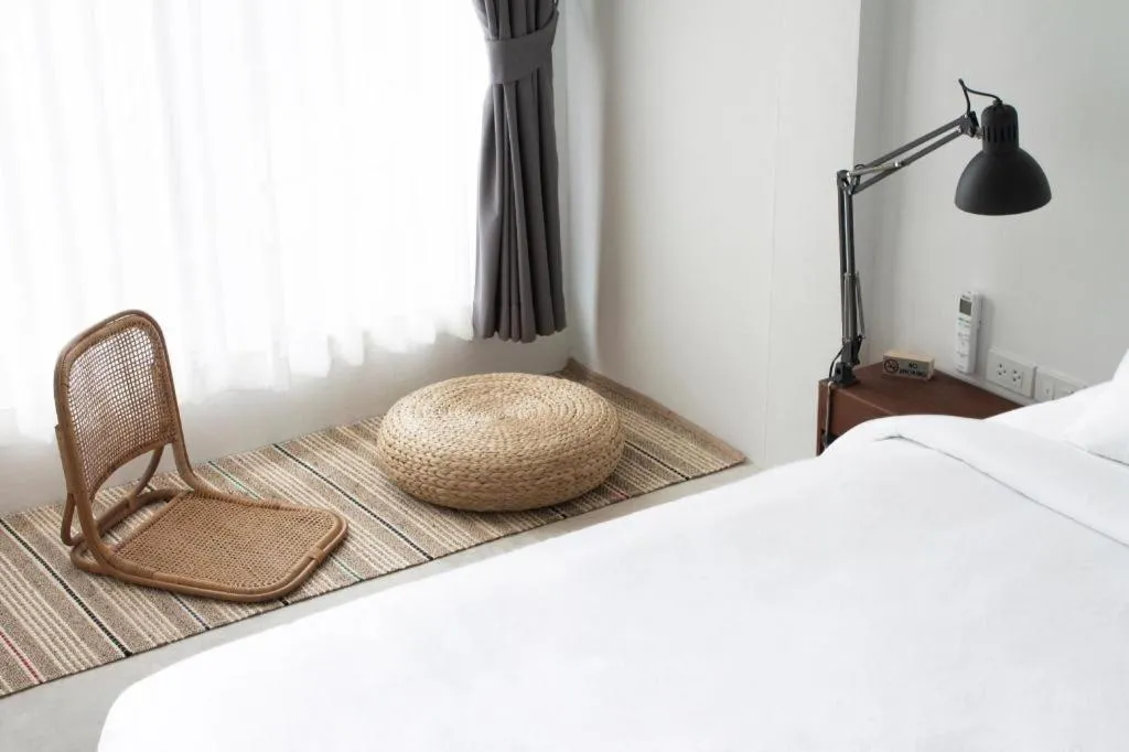 Bed in Rangsiya Boutique Hotel