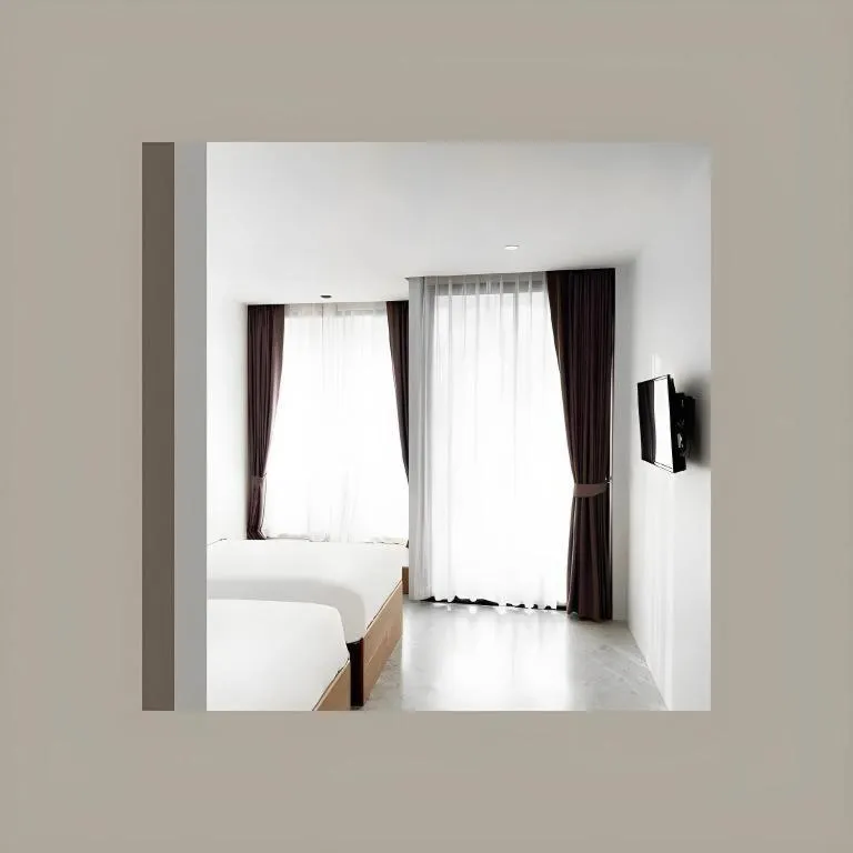 Bed in Rangsiya Boutique Hotel