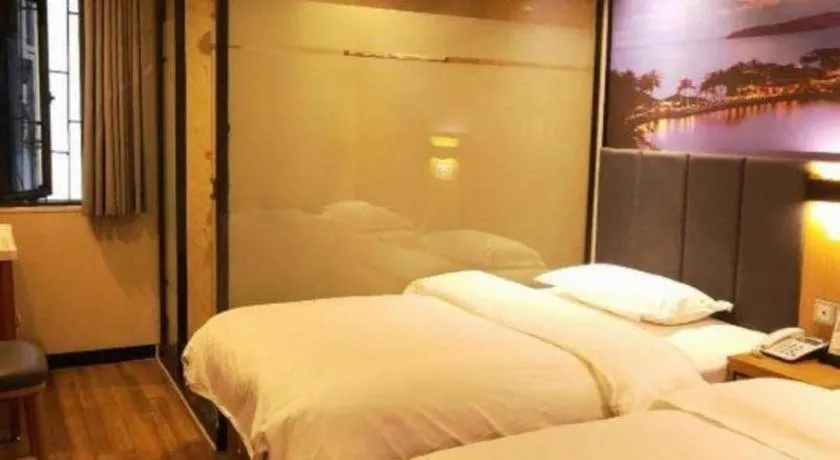 Bed in Yimi Hotel Guangzhou Sport College Branch