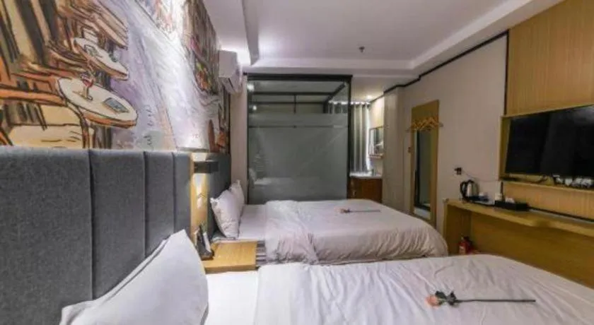 Bed in Yimi Hotel Guangzhou Sport College Branch