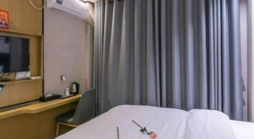 Bed in Yimi Hotel Guangzhou Sport College Branch