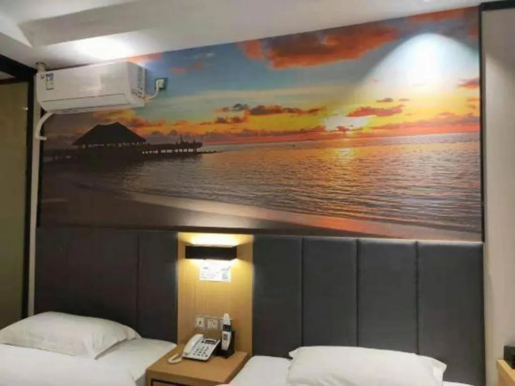 Bed in Yimi Hotel Guangzhou Sport College Branch