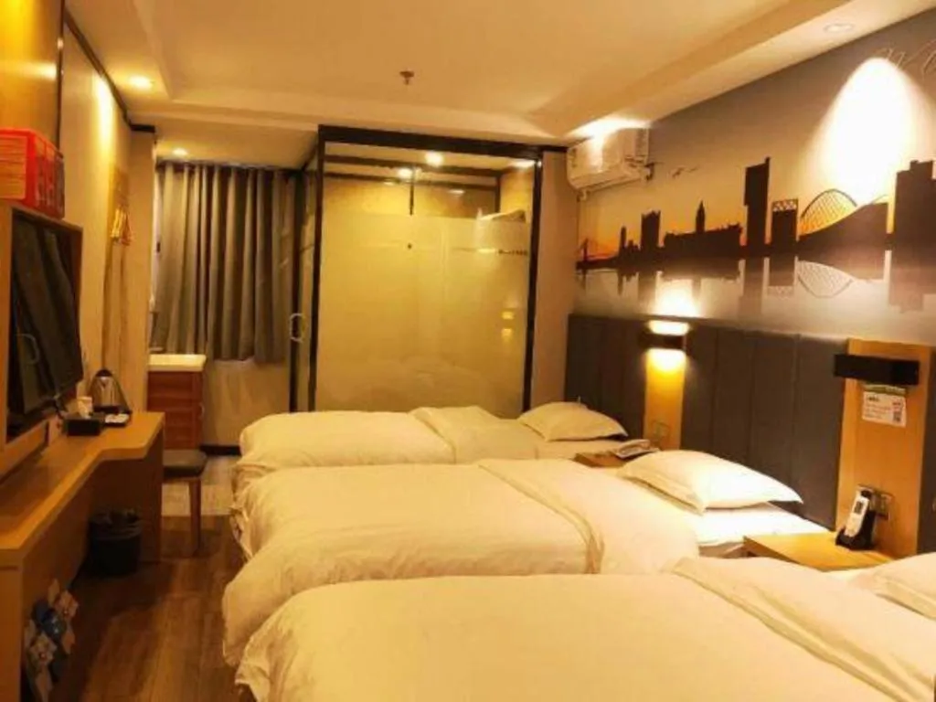 Bed in Yimi Hotel Guangzhou Sport College Branch