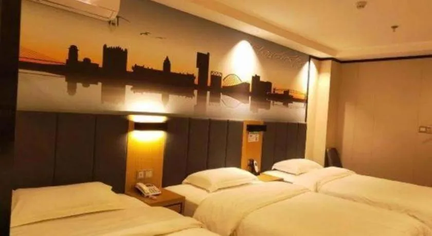 Bed in Yimi Hotel Guangzhou Sport College Branch