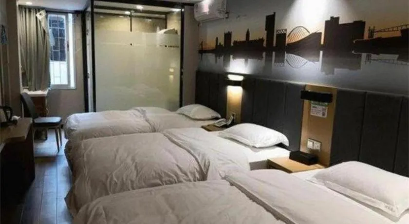 Bed in Yimi Hotel Guangzhou Sport College Branch