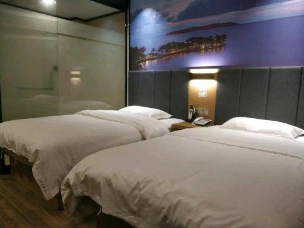 Bed in Yimi Hotel Guangzhou Sport College Branch