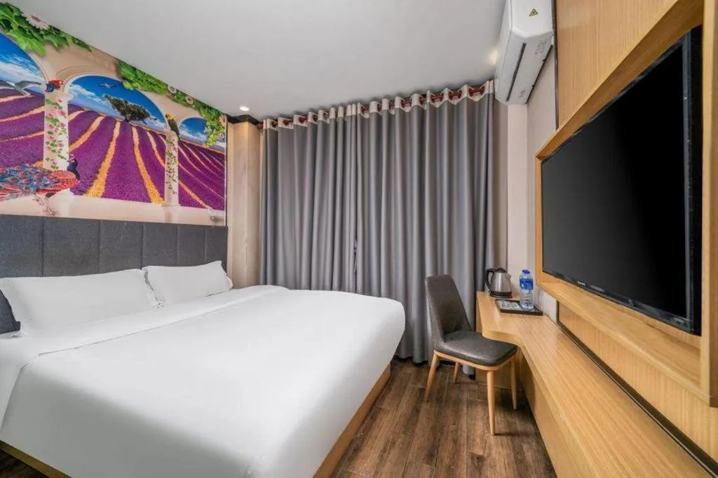 Bed in Yimi Hotel Guangzhou Sport College Branch