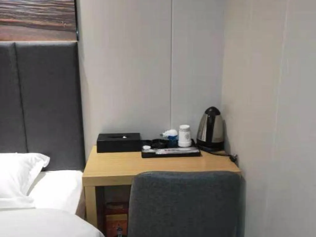 Bed in Yimi Hotel Guangzhou Sport College Branch