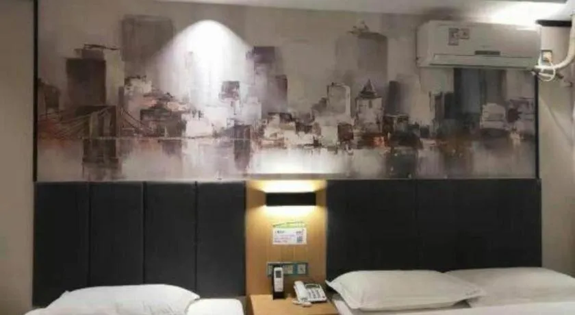 Bed in Yimi Hotel Guangzhou Sport College Branch