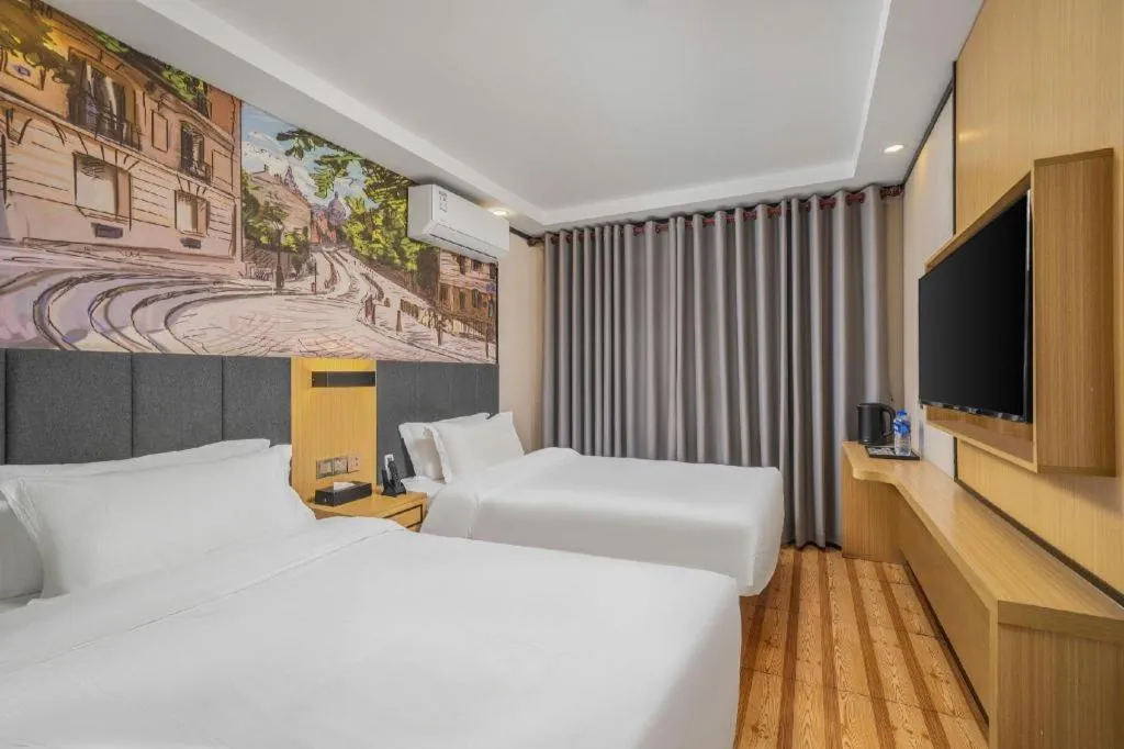 Bed in Yimi Hotel Guangzhou Sport College Branch