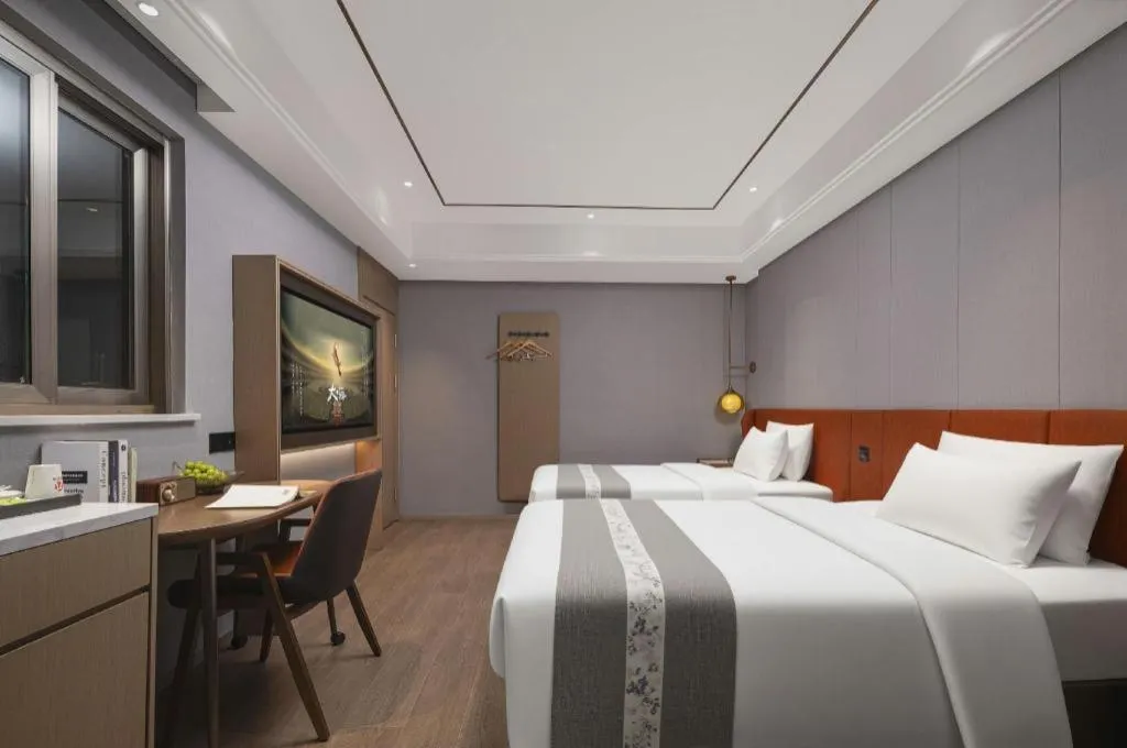 Bed in PAI Hotel·Chengdu Jintang Huaikou Huaizhou Avenue