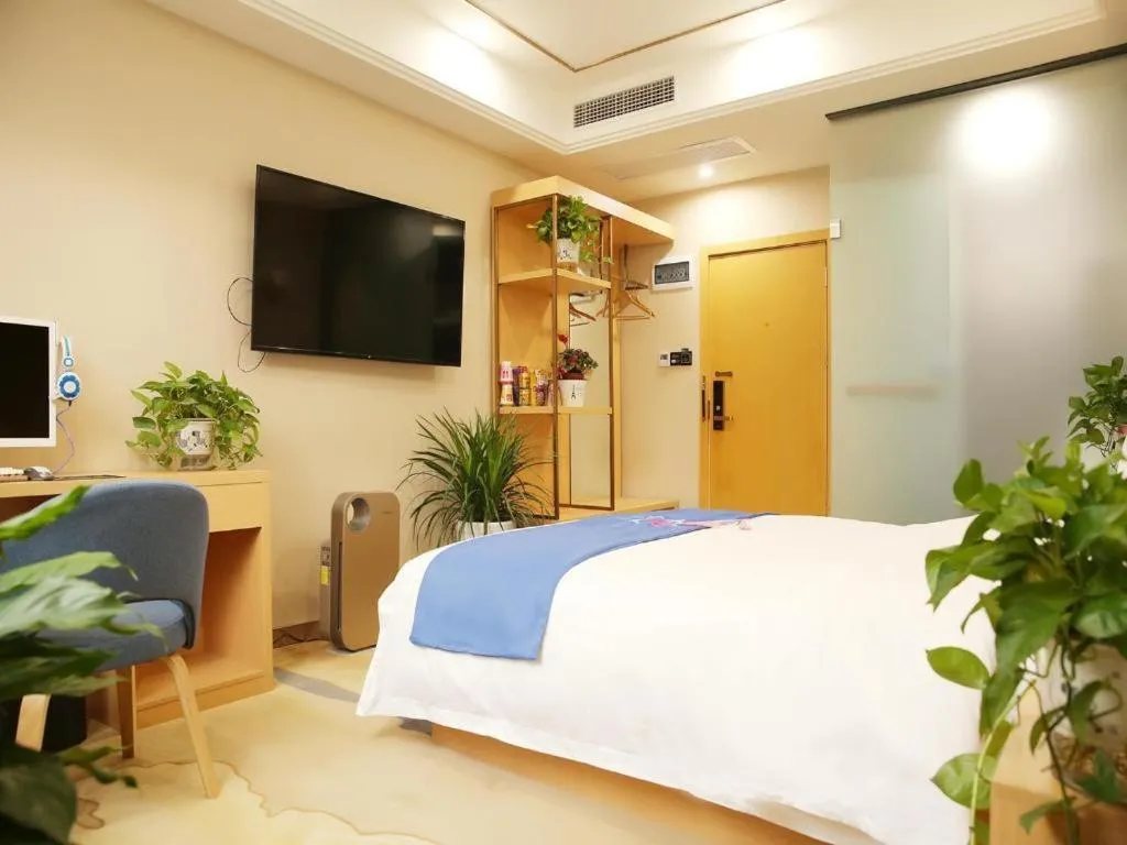 Bed in PAI Hotel·Chengdu Jintang Huaikou Huaizhou Avenue