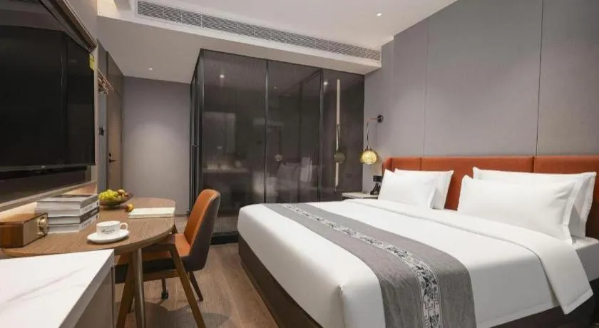 Bed in PAI Hotel·Chengdu Jintang Huaikou Huaizhou Avenue