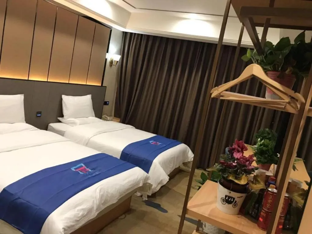 Bed in PAI Hotel·Chengdu Jintang Huaikou Huaizhou Avenue