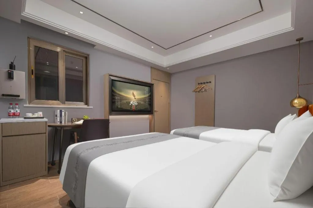 Bed in PAI Hotel·Chengdu Jintang Huaikou Huaizhou Avenue