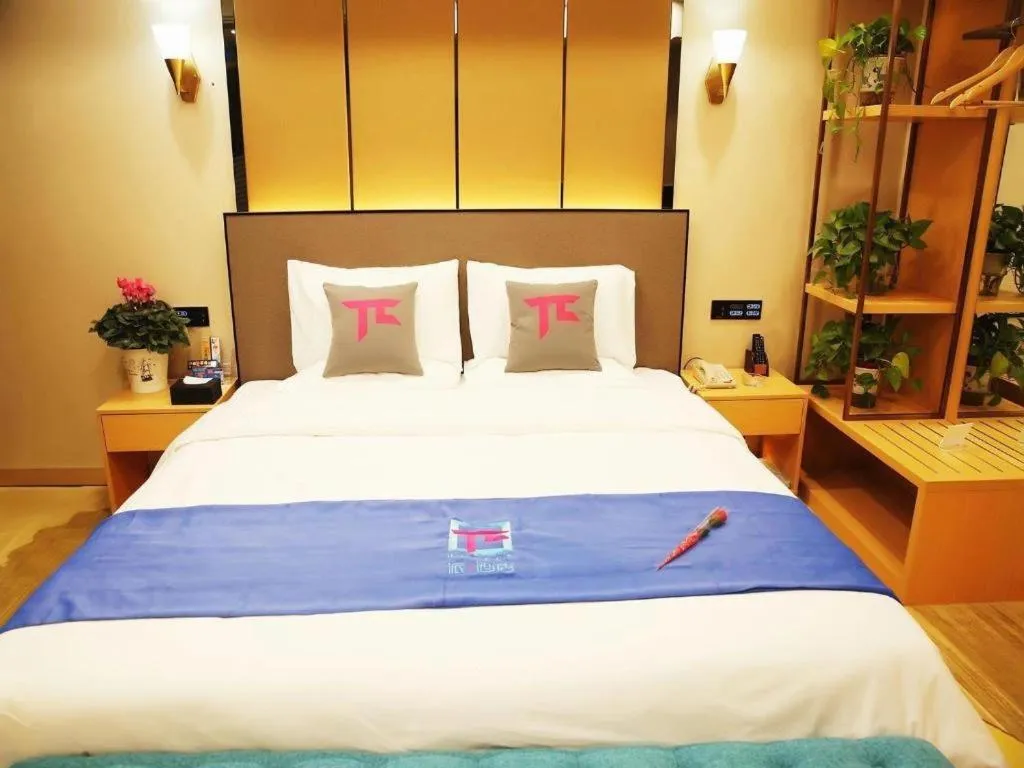 Bed in PAI Hotel·Chengdu Jintang Huaikou Huaizhou Avenue