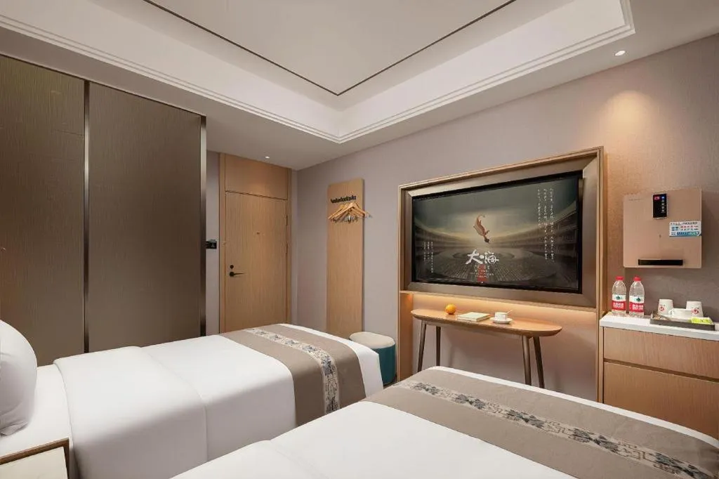 Bed in PAI Hotel·Chengdu Jintang Huaikou Huaizhou Avenue