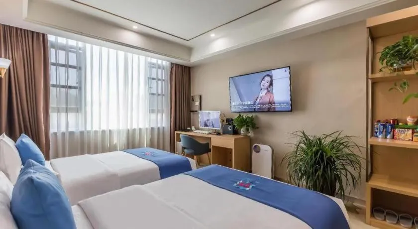 Bed in PAI Hotel·Chengdu Jintang Huaikou Huaizhou Avenue