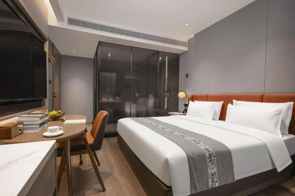 Bed in PAI Hotel·Chengdu Jintang Huaikou Huaizhou Avenue