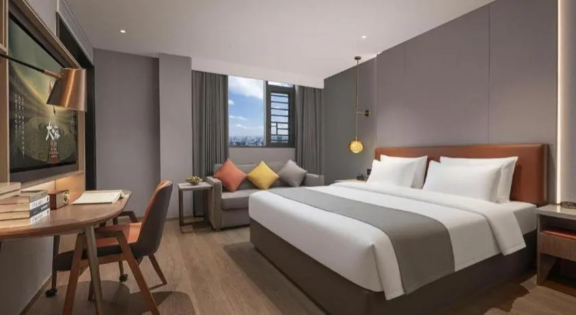 Bed in PAI Hotel·Chengdu Jintang Huaikou Huaizhou Avenue