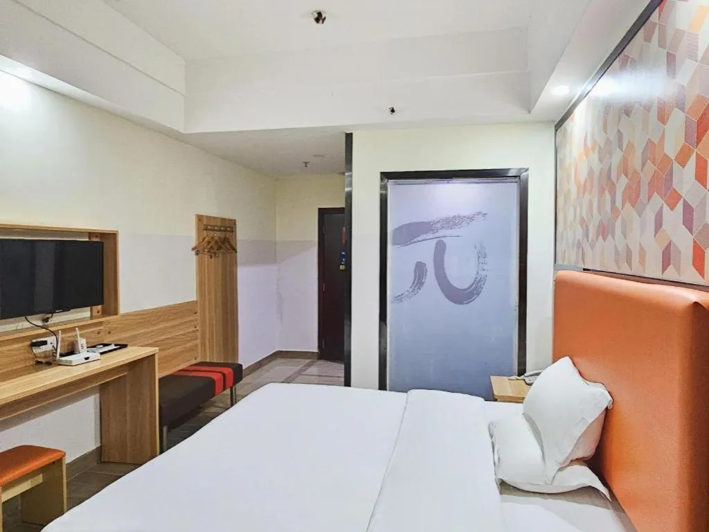 Bed in PAI Hotel·Huazhou Bus Terminal