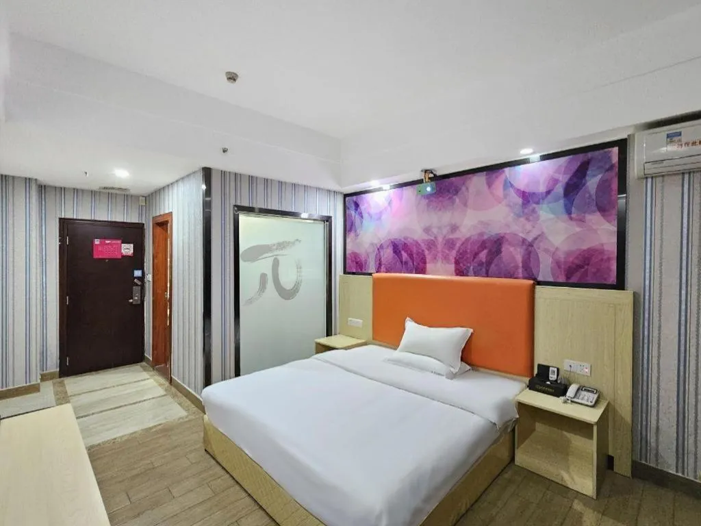 Bed in PAI Hotel·Huazhou Bus Terminal