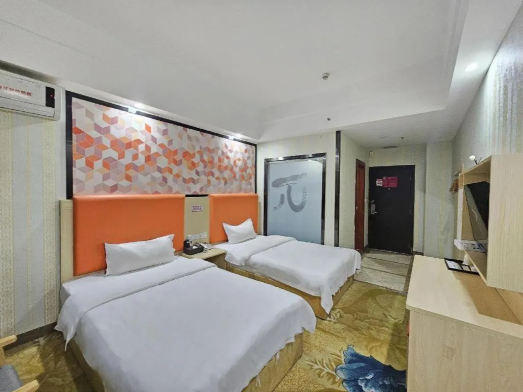 Bed in PAI Hotel·Huazhou Bus Terminal