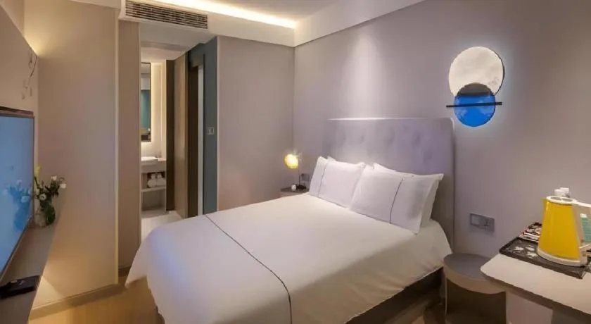 Bed in Magnotel Hotel Shiyan Wuyan Pedestrian Street