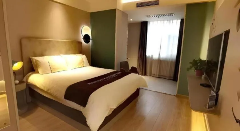 Bed in Magnotel Hotel Shiyan Wuyan Pedestrian Street