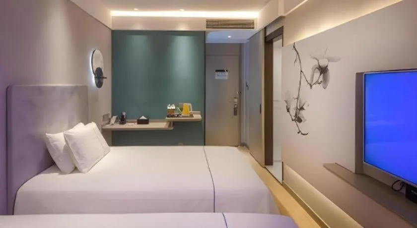 Bed in Magnotel Hotel Shiyan Wuyan Pedestrian Street